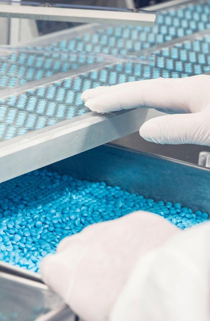 2016Nov-stock-healthcare-drug-factory-worker-pharmaceuticals-pilot-hero720x1100.jpg