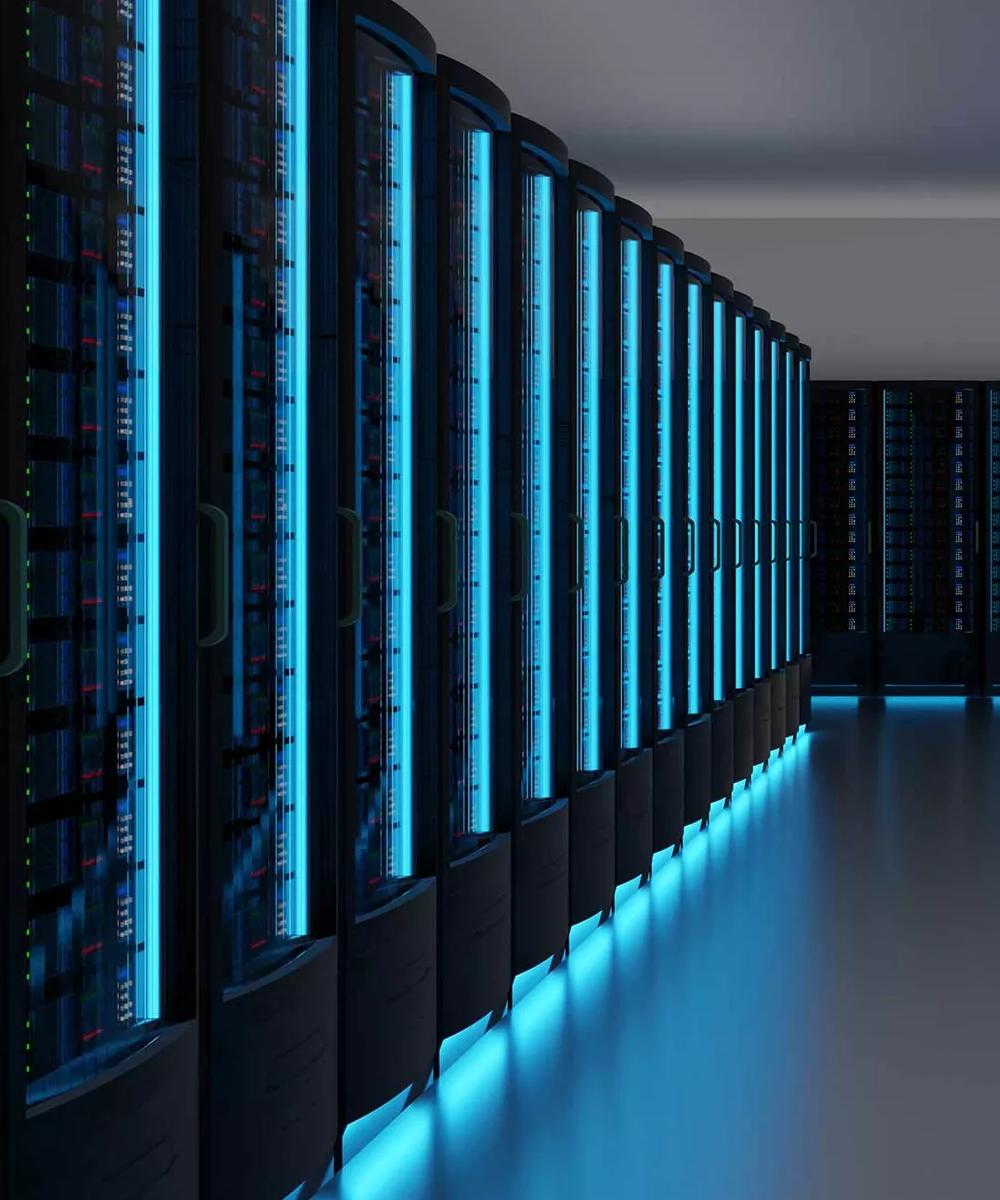 Racks illuminated by vertical strips of intense blue LED light.