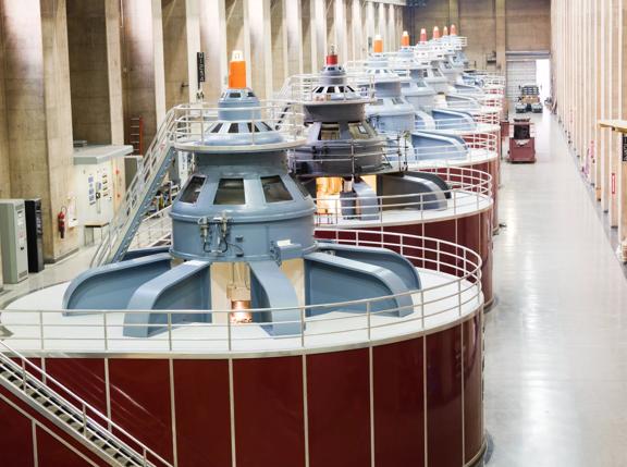 Turbines of hydroelectricity power station generators inside the Hoover Dam fuel and power generation plant, Arizona, Nevada, USA.