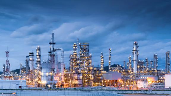 Oil Refinery, Chemical & Petrochemical plant abstract at night.