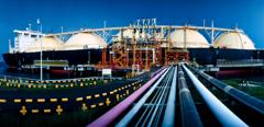 Stock Image- LNG Tanker loading Liquified Natural Gas at Asian liquefaction plant.