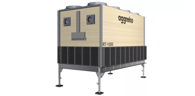 A tan, box-like unit is elevated on gray legs, features black lower ventilation screens, circular ports, and has multiple fans visible on the roof.