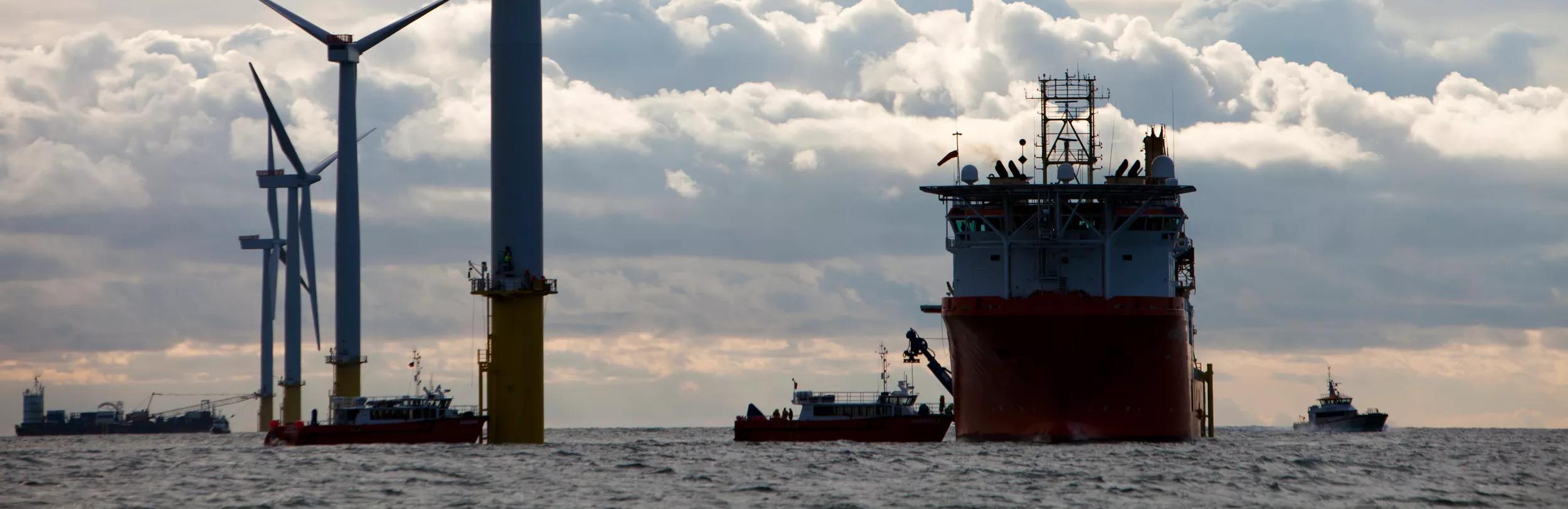 A cable laying vessel laying electricity cable for the Walney offshore wind farm, Barrow in Furness, Cumbria, UK.