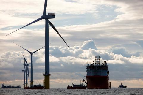 A cable laying vessel laying electricity cable for the Walney offshore wind farm, Barrow in Furness, Cumbria, UK.