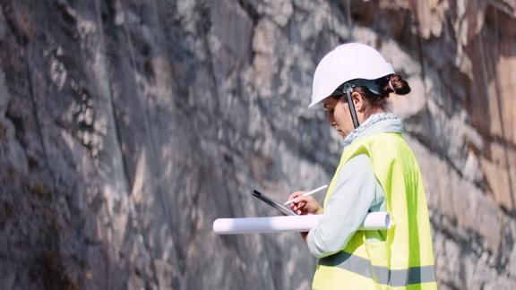 Woman engineer working in the road construction industry.
