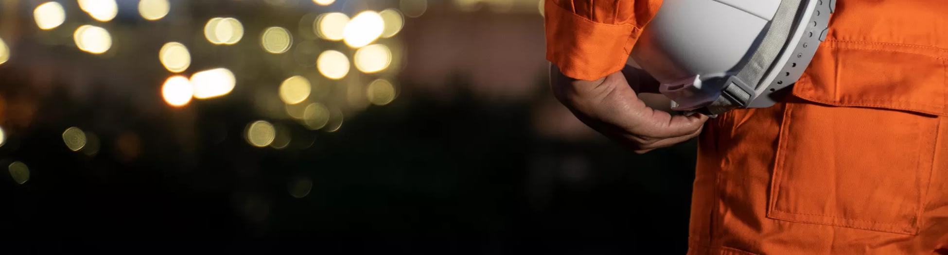 Engineer and blur refinery oil background.