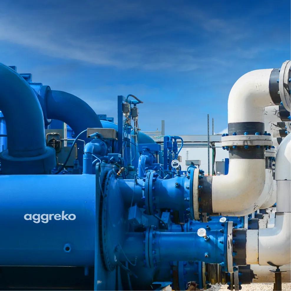 Close-up view of blue Aggreko industrial units