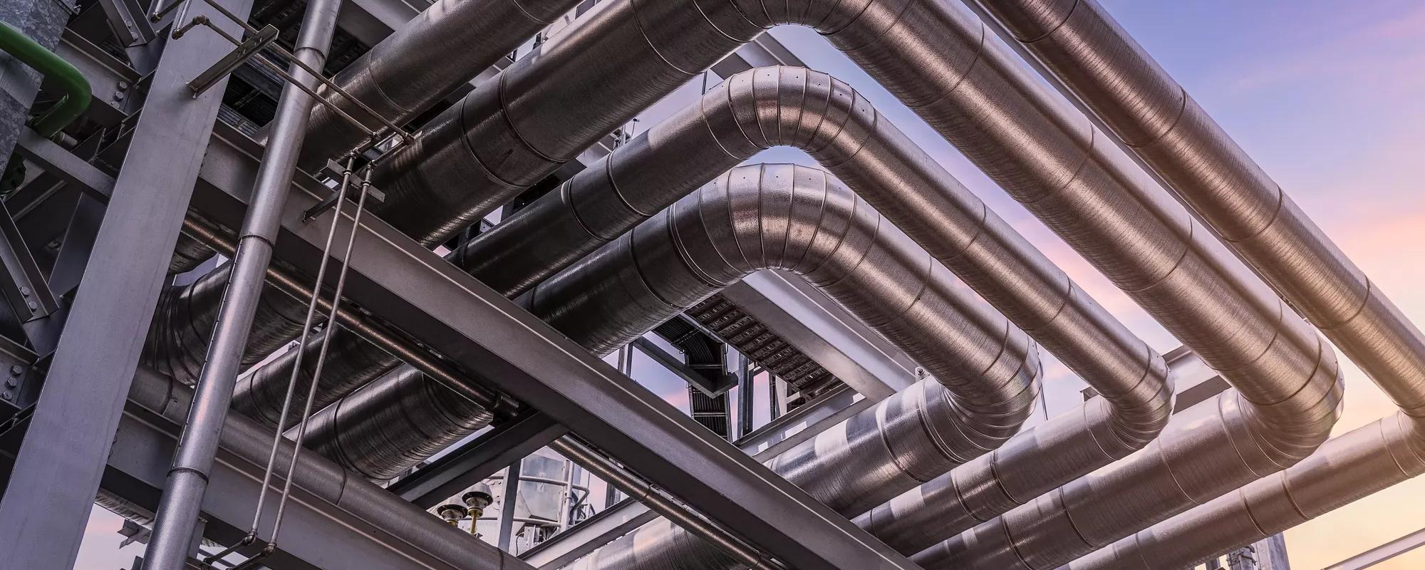 pipeline of oil and gas at industry zone.The pipe of factory ,Close-up of industrial steel pipelines at oil-refinery plant and sky
