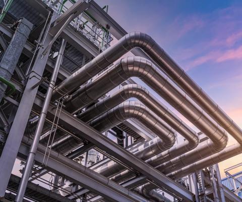 pipeline of oil and gas at industry zone.The pipe of factory ,Close-up of industrial steel pipelines at oil-refinery plant and sky