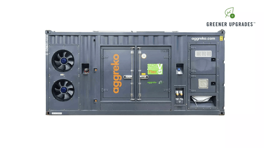 A large dark gray 1200 kW Tier 4F diesel generator with fans doors and text labelling Aggreko and labeled Greener Upgrades.