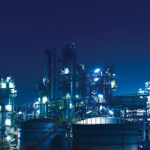 Oil Refinery, chemical & petrochemical plant at night.