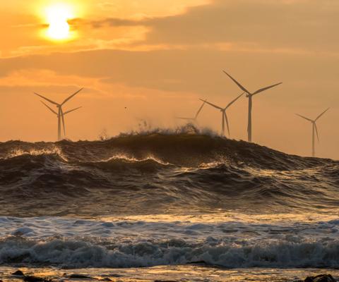 Wind turbines at sunrise off the North East coast
