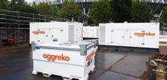 Aggreko generators and fuel tanks in front of a stadium