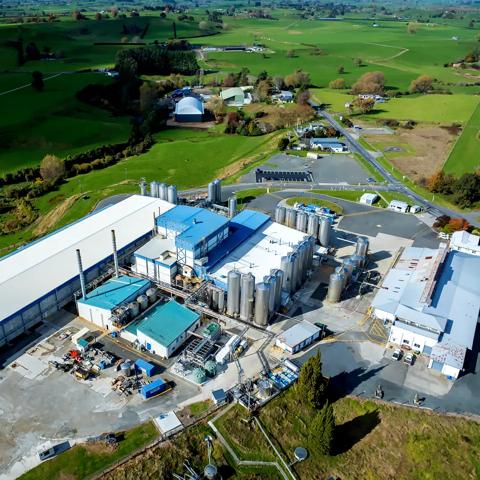 Aerial view of a blue and white dairy farm.