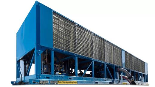 Large industrial cooling unit with a blue exterior, featuring metal grates and mounted on a sturdy base for stable operation.