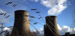 2017-02-power-station-utilities-towers-grass-foreground.jpg