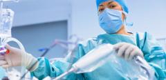 Surgeons performing surgery in operating Theater.