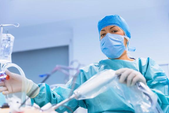 Surgeons performing surgery in operating Theater.