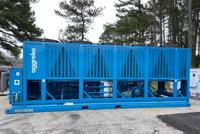 A large blue air cooled fluid chiller with multiple cooling units.