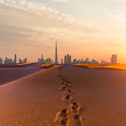 Looking along desert towards the Dubai business district.