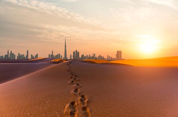 Looking along desert towards the Dubai business district.