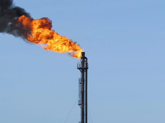 System of a torch on an oil field. Burning through a torch head.