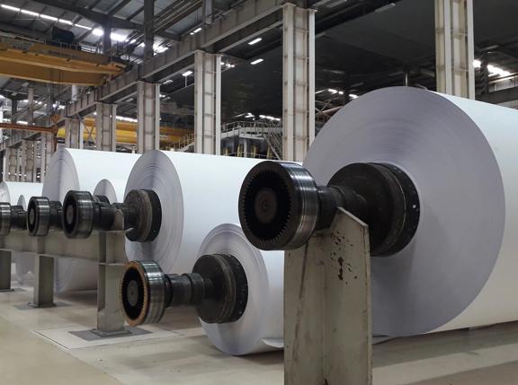 Machines for the production of paper rolls and roll of white paper in modern paper cutting machine