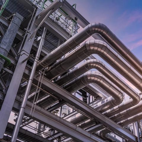 pipeline of oil and gas at industry zone.The pipe of factory ,Close-up of industrial steel pipelines at oil-refinery plant and sky