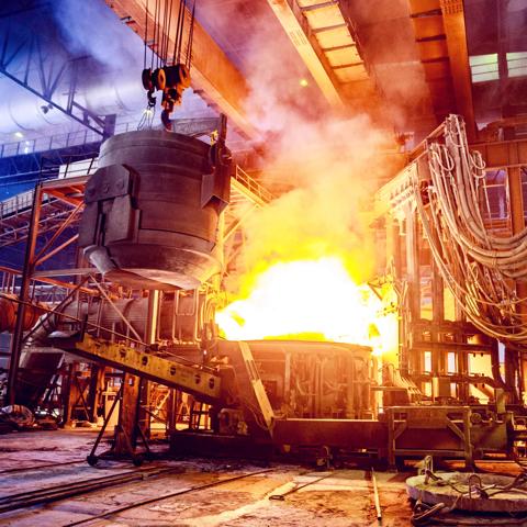 Steel, Factory, Business, Industry, Africa - Scrap metal being poured into an Electric Arc Furnace