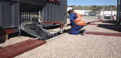 Aggreko technicians working on Mossel Bay project South Africa. 10 MW utility power.