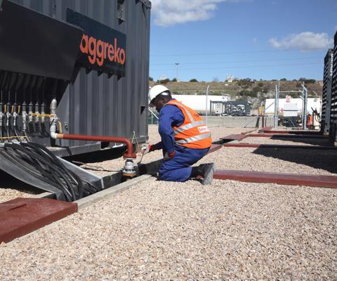 Aggreko technicians working on Mossel Bay project South Africa. 10 MW utility power.