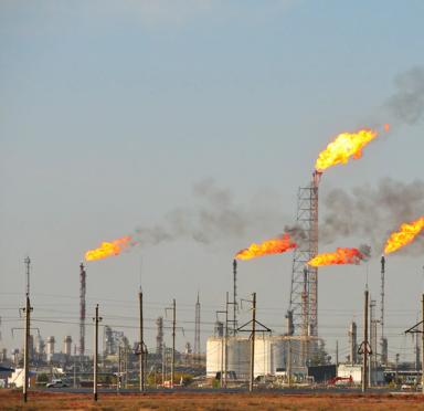 Gas flaring at an oil refinery.