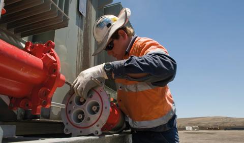 Technician working on shovel walk project in Australia