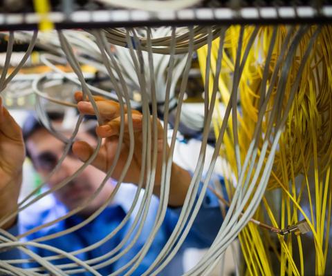 2017Jan-stock-technician-fixing-cable-computer-data_centres