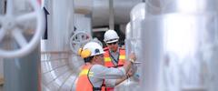 an Asian engineer conduct process safety inspection