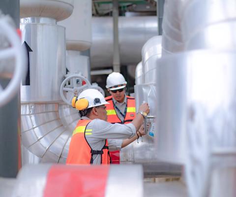 an Asian engineer conduct process safety inspection