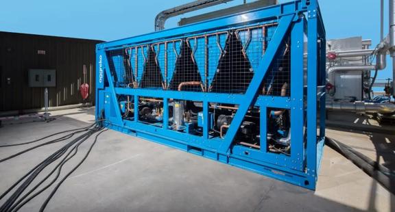 A blue Aggreko chiller seen from behind at a worksite