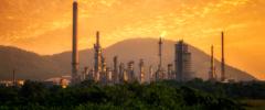 Oil refinery at sunset