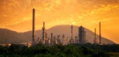 Oil refinery at sunset