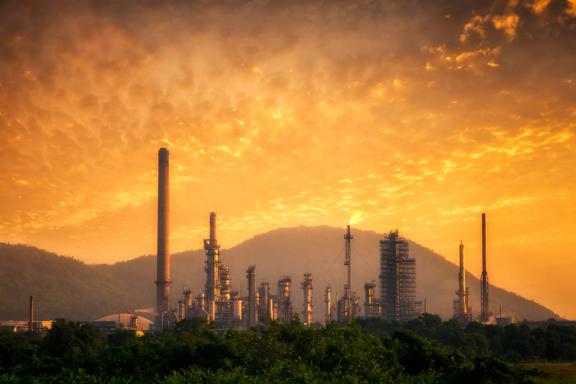 Oil refinery at sunset
