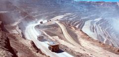 2017-05-trucks-driving-through-mining-pit.jpg