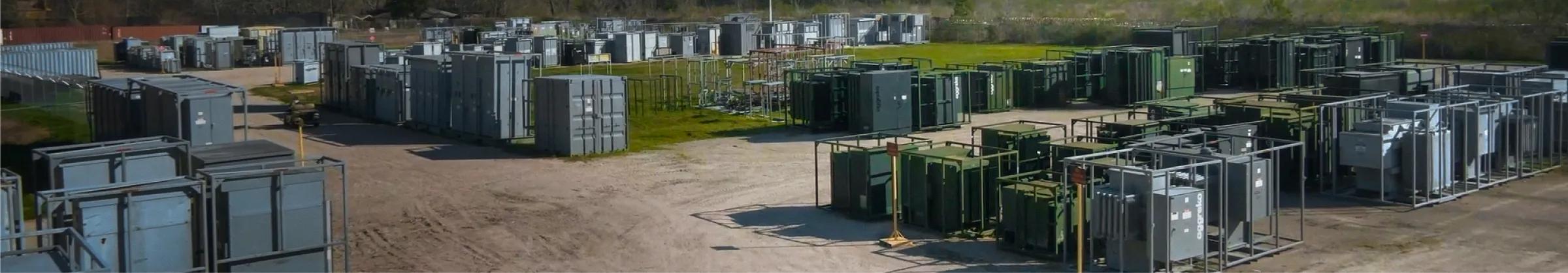 multiple rows of Aggreko's electrical distribution equipment in a field