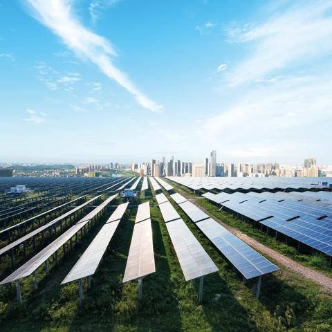 solar panel with cityscape of los angeles in cloud sky