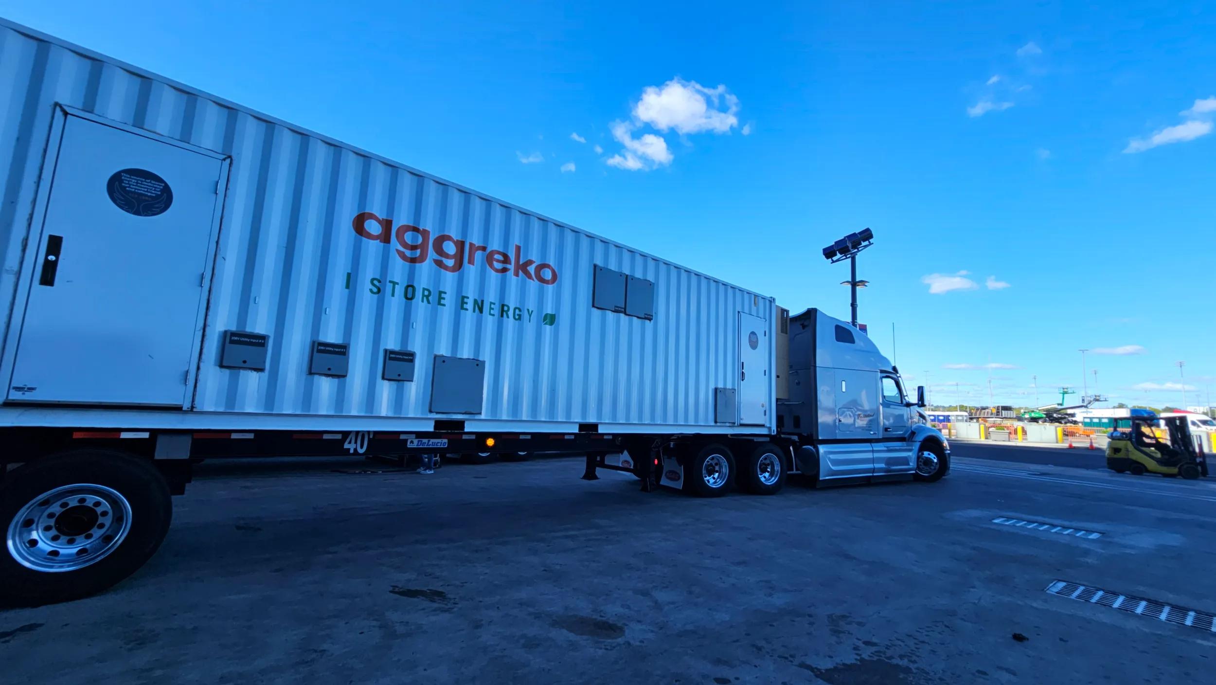A white Aggreko 'Store Energy' trailer.