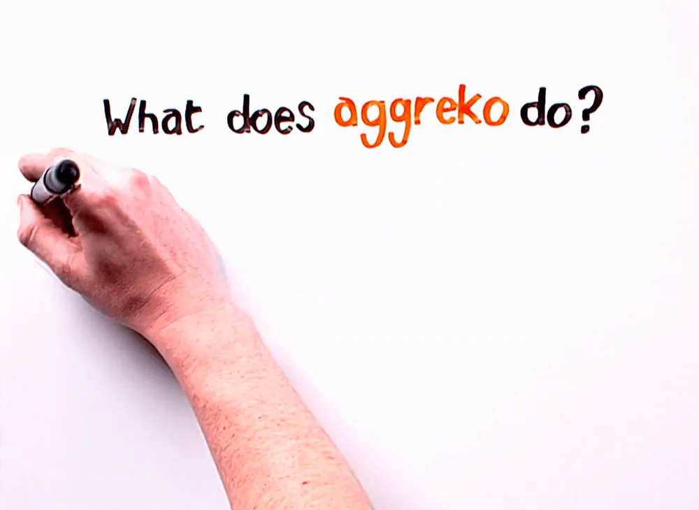 Image of a hand writing on a blackboard, explaining what Aggreko does.