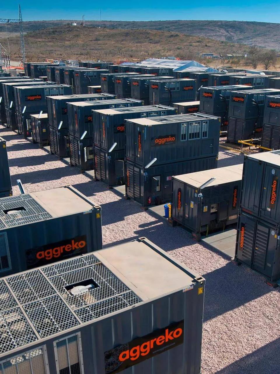 Aggreko generator units in rows at a post-hurricane recovery site in Houston