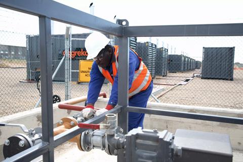Aggreko technicians working on Mossel Bay project South Africa. 10 MW utility power.