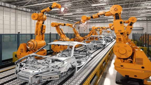 Automated robotic arms working on car assembly in a modern factory. Sleek, metallic car frames are on the production line.
