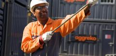 Technician with container