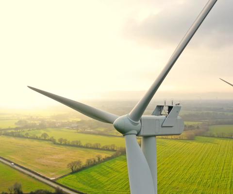 Aerial photo of wind turbines at sunset in Sainte Pazanne, France